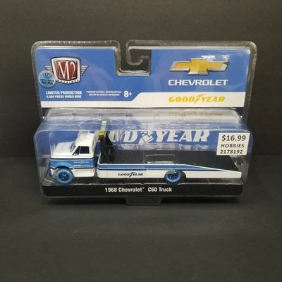 CHASE 2022 M2 Machines 1968 Chevrolet C60 GoodYear Flat Bed Truck *BLUE TIRES* - Image 1 of 4