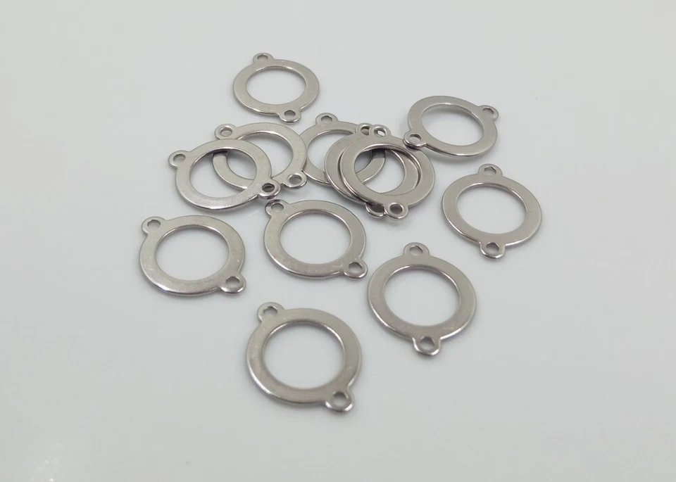 10pz connettori tondo in acciaio inox colore argento scuro 19x14mm bijoux - Immagine 1 di 1