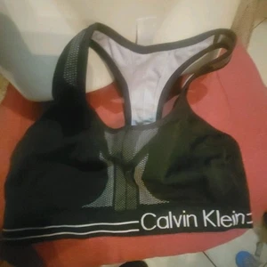 Sujetador deportivo Calvin Klein Mrdium inalámbrico espalda deportiva sin relleno negro - Imagen 1 de 3