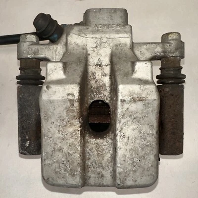 Pinza de freno del conductor trasero izquierdo Toyota Camry 2013-2017 fabricante original Foto 1 de 4