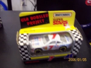 Matchbox 1:64 NASCAR 1993 Ford Thunderbird #7 Jimmie Hensley USA - Picture 1 of 1