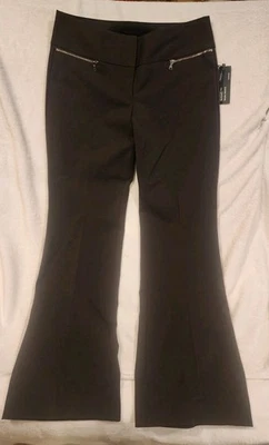 Pantalones elásticos Express negros Studio Stretch Editor acampanados talla 8R Foto 1 de 4