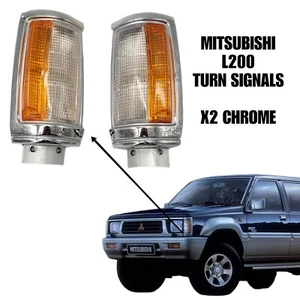 Mitsubishi L200 1987 /1998 turn signals lights x2 Chrome Bezel - Picture 1 of 6