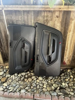 Paneles de puerta delanteros izquierdo y derecho Ford Mustang 2005-2009 OEM negros W5246 Foto 1 de 4