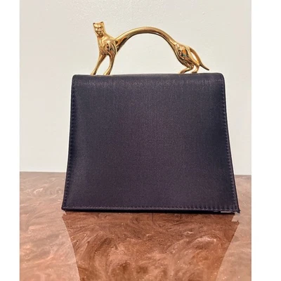 Cartera de colección SASHA dorada con asa de gato negra Foto 1 de 4