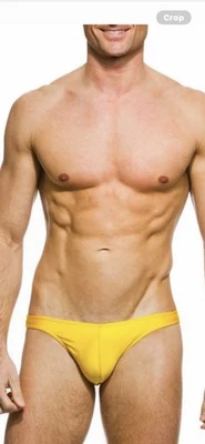 MENS / LADS KINIKI ANDRE YELLOW MICRO SWIM TRUNKS SIZE SMALL NEW IN SEALED BAG - Image 1 of 4