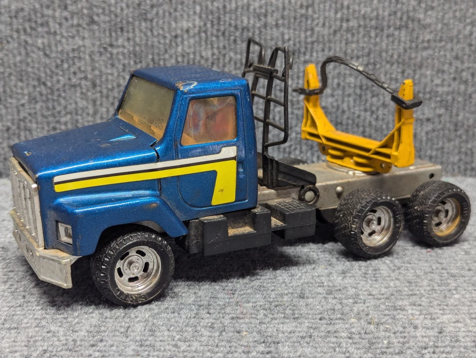 Vintage ERTL International Logging Truck 1:25 Diecast Toy Blue Yellow USA #3605 - Image 1 of 4