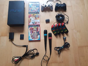 Sony Playstation 2 Spielkonsole mit PS2 Buzz und Singstar Zubehörpaket - Bild 1 von 1