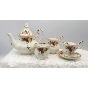Childs Vintage Porcelain Tea Set Gold Trim Floral Rose Teapot Cup Creamer Sugar - Picture 1 of 13
