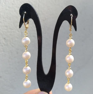 Par de pendientes redondos de perlas blancas AAA+ AKOYA naturales de 6-7 mm de oro de 14 k P - Imagen 1 de 6