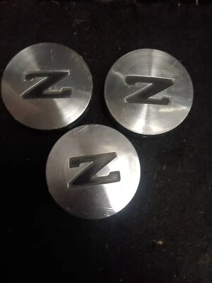 ✅️ Tapacubos centrales de llantas de aleación Nissan 300ZX de fábrica 1984 a 1989 40343 03P00 Foto 1 de 4