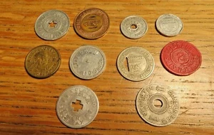 Small lots 10 tax, bus fare, and advertising tokens. - Picture 1 of 9