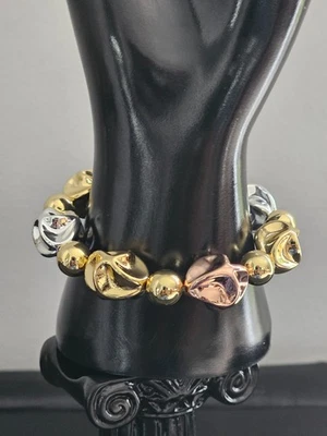 Pulsera Unisex Ritmo Texturizado Elástico Oro, Plata y Bronce Foto 1 de 2