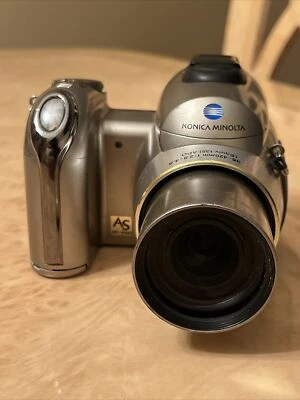Konica Minolta DiMAGE Z6 6.0MP Digital Camera -Silver No Lens cap Or Strap WORKS - Image 1 of 4