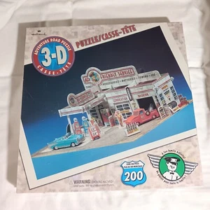 HALLMARK Sealed 3D Puzzle Adventure Road Al's Friendly Service Garage 200+ Piece - Picture 1 of 5