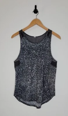 Camiseta sin mangas Lululemon esculpida negra/blanca con estampado de puntos para mujer talla 6 Foto 1 de 4
