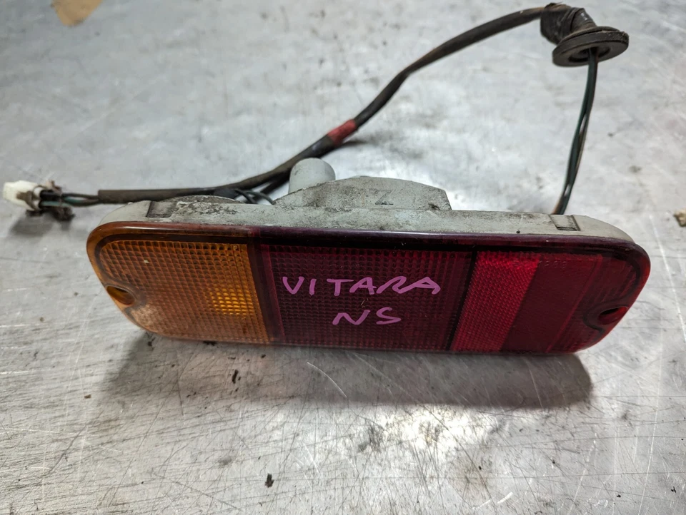 2002 SUZUKI VITARA PASSENGER NS SIDE BUMPER LIGHT REAR LIGHT - Image 1 of 1