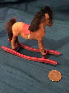 dollhouse miniatures artist offering toy rocking horse