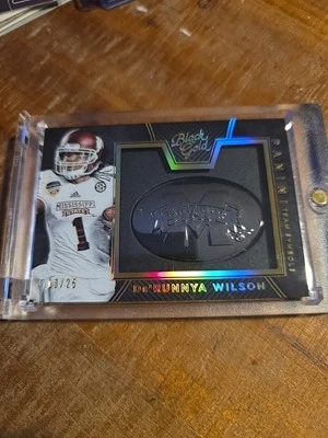 2016 PANINI BLACK GOLD Derunnya Wilson TEAM SYMBOLS RC RELIC 13/25 Miss State - Image 1 of 4