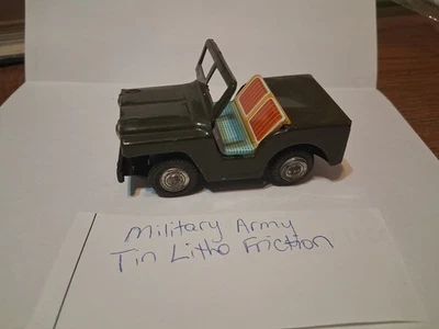 EJÉRCITO MILITAR - Juguete de fricción Jeep litográfico de hojalata raro asientos coloridos - Funciona Foto 1 de 4