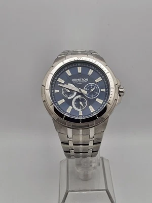 Reloj Armitron 6P29 Cuarzo Hombre Multifunción Día Fecha 46mm Esfera Azul Tono Plateado Foto 1 de 4