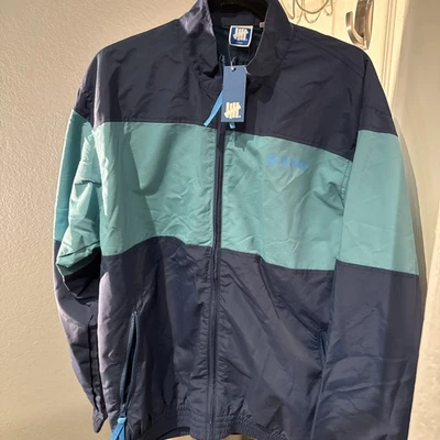 JUEGO CORTAVIENTOS INVICTO STREETWEAR talla L Foto 1 de 4