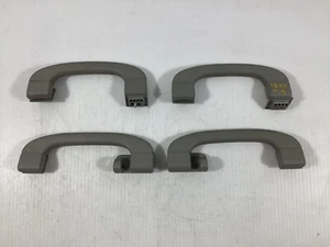 BMW X5 2012-2018 Juego de manijas de agarre de techo superior lateral trasero OEM. - Imagen 1 de 8