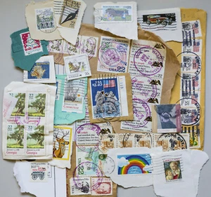 Worldwide stamps on paper. From the 1980s. - Picture 1 of 7