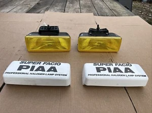 PIAA 70 HALOGEN FOG LIGHTS LAMPS 130W NEW NOS 7051 See Pics YELLOW! Vintage - Foto 1 di 11