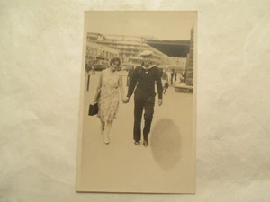 RPPC Real Photo Postcard Navy Sailor and girlfriend ? Wife streetcar background - Picture 1 of 2