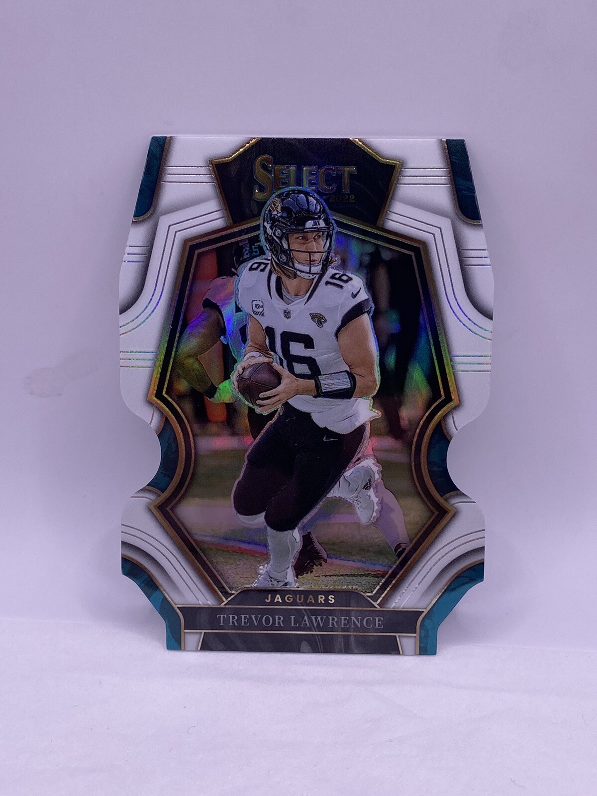 TREVOR LAWRENCE #34/49 2022 SELECT #145 PREMIER LEVEL DIE-CUT WHITE PRIZM SP