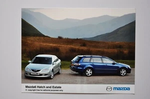 Foto de prensa de coche - Mazda 6 escotilla y Estate - vista frontal/lateral metálica y azul - Imagen 1 de 1
