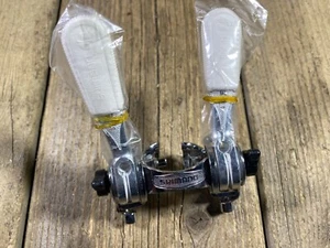 PALANCAS DE CAMBIO TUBO DESCENDENTE BICICLETA SHIMANO PALANCAS DE FRICCIÓN CUBIERTAS DE PALANCA BLANCAS NOS - Imagen 1 de 5