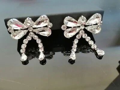 Signed ALESSANDRA RICH Gleaming Dangling Crystal Silvertone Clip Earrings 6cm - image 1 of 4