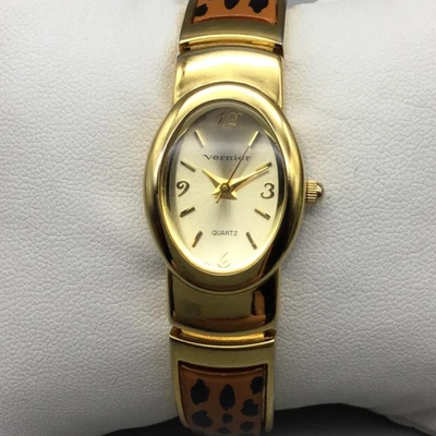 Vernier 女士手表 19 毫米金色豹纹铰边手镯全新电池 — 第 1/4 张图片