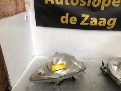 Hauptscheinwerfer links Daihatsu Cuore VII L276  P21239013 - Bild 1 von 3