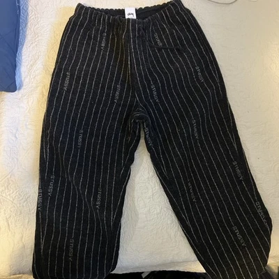 Pantalones largos de lana a rayas Nike x Stussy talla pequeña, negro/blanco, DR4021-010 Foto 1 de 2