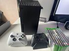 xbox series x console, 2 x controllers witch charge docks and 9 games 