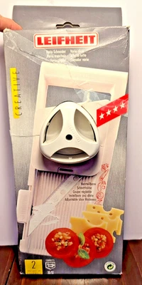 Mandolina cortadora ajustable Leifheit Vario hoja de acero inoxidable borde festoneado Foto 1 de 4