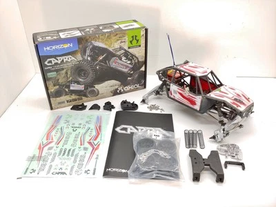 Chasis deslizante de rodillos sobre orugas Axial Capra 1/10 4x4 RC con motor y carrocería personalizada Foto 1 de 4