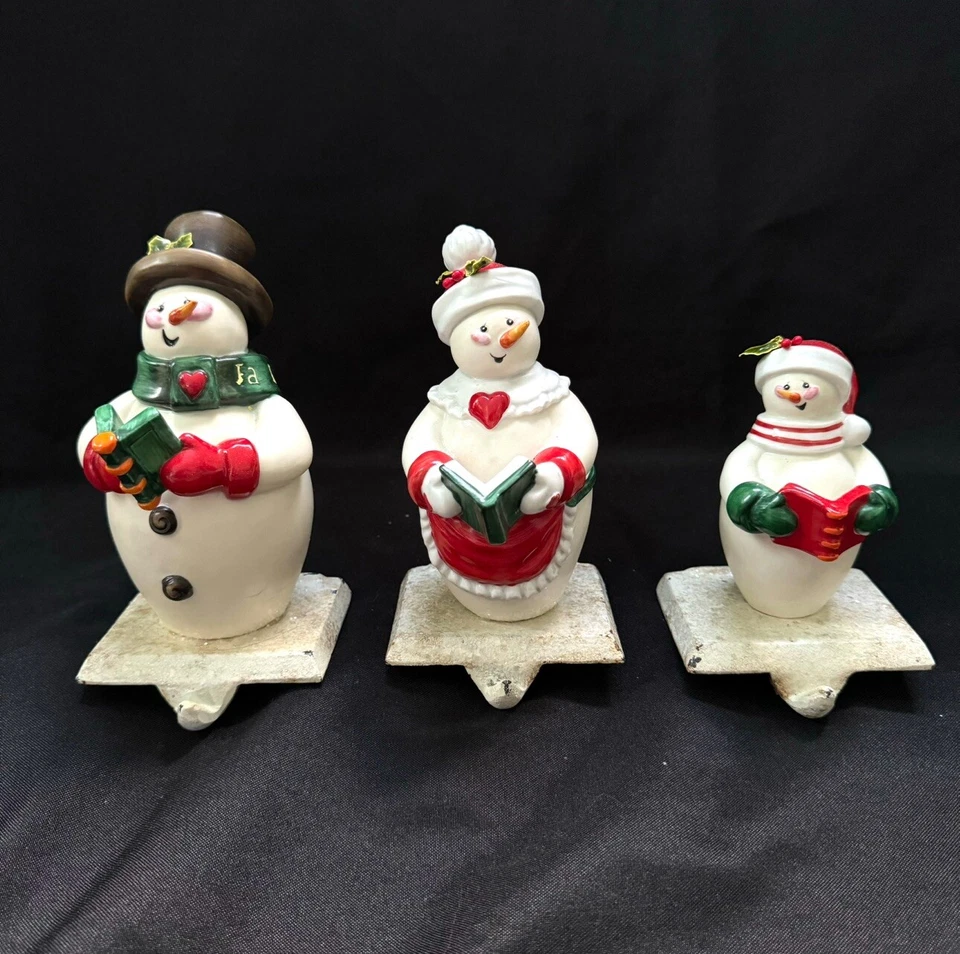 Snowman Family Caroling Stocking Hanger Holder Set of 3 Ceramic on Cast Base GAC - Image 1 of 4