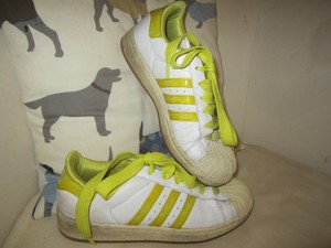 mustard coloured adidas trainers