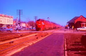 DUPLICATE EKTACHROME SLIDE GULF, MOBILE & OHIO RAILROAD F-7 #101 AT STATION - Picture 1 of 1