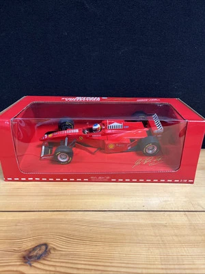 1:18 MINICHAMPS F1 Formula 1 FERRARI Michael Schumacher 1998 Presentation - Image 1 of 4