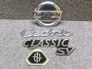 Nissan Cedric Y34 Infiniti M45 Front Hood Silver Chrome Emblem JDM OEM - Picture 1 of 8
