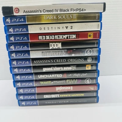 Lote de 13 juegos PS4: Assassin's Creed, Dark Souls III, Doom, GTA V usados Foto 1 de 4