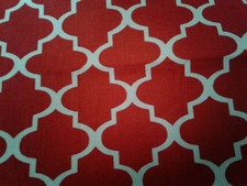 White Design on Red Fabric Scrap Quilt Sew