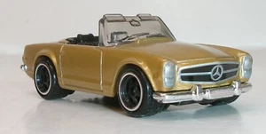 Caja de cerillas suelta 2025 1:64 oro 1963 mercedes-benz 230 sl intercambio de ruedas pilotos reales - Imagen 1 de 9