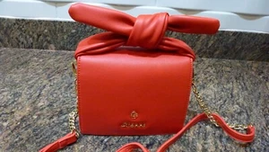 A SMALL ORANGE BAG BRAND NEW WITH BOW HANDLE - Picture 1 of 7