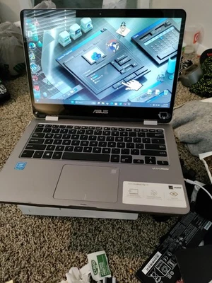 ASUS TP401 14." (128 GB eMMC/128 GB NVMe, Celeron N4020, 1,1 GHz, 4 GB 25H2 11PRO Foto 1 de 4